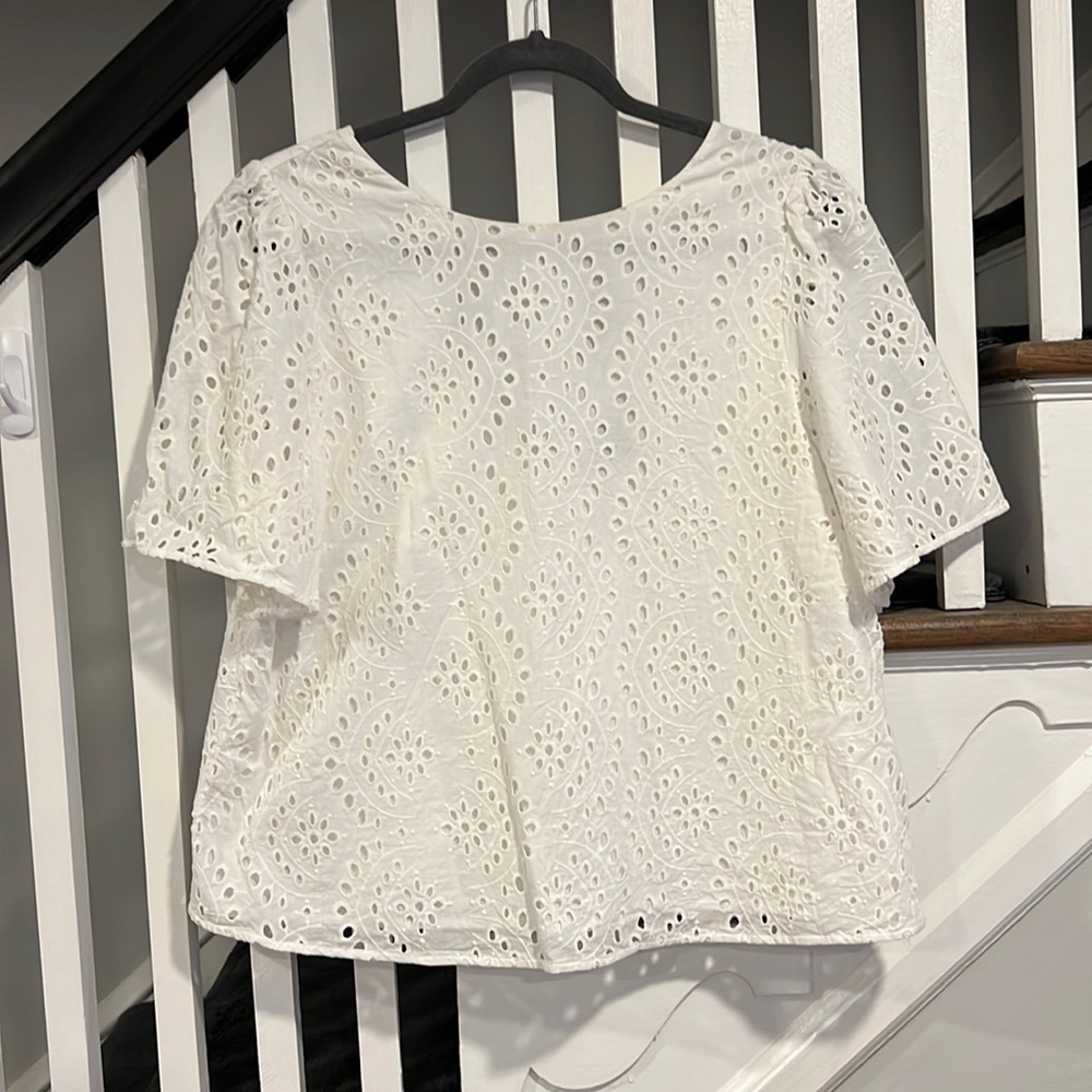 White eyelet short sleeved blouse